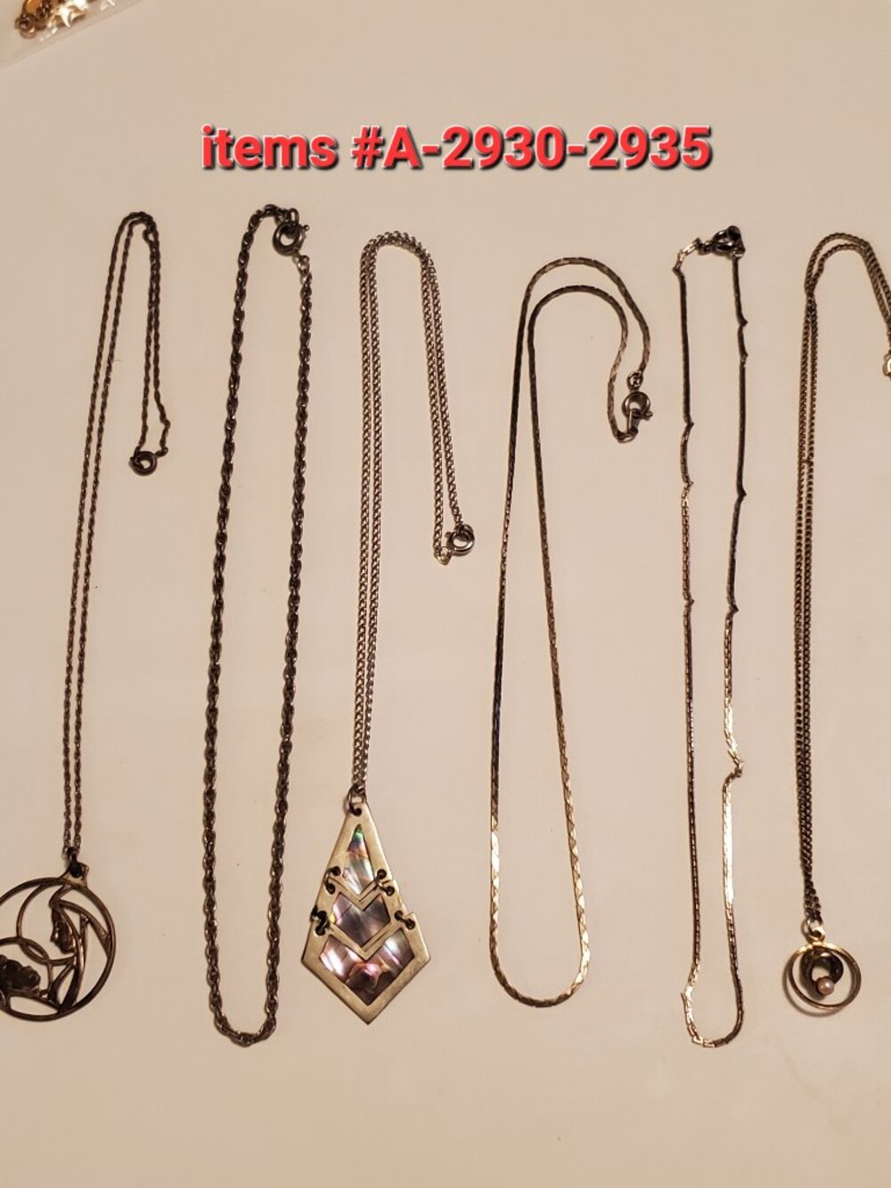 6 Silver chain necklaces, items # A 2930-2935, wt. 23 grams.